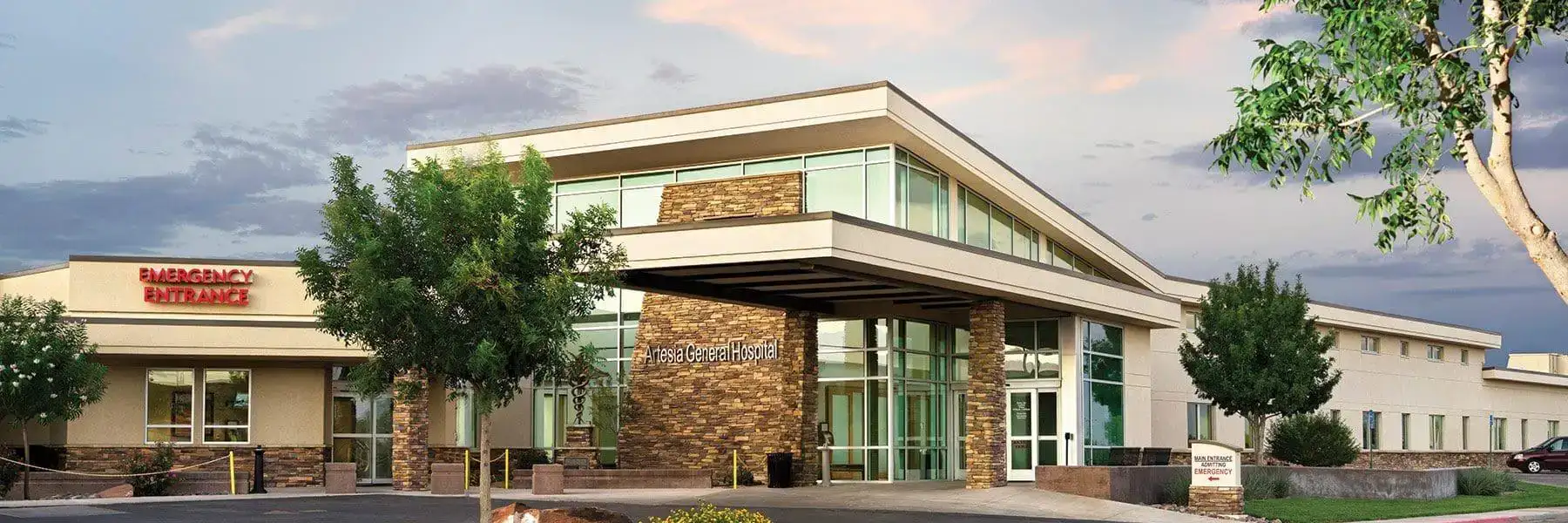 The main entrance of Artesia General Hospital, a multi-specialty healthcare provider serving patients across Artesia, Carlsbad, and Roswell with 24/7 emergency, surgical, and diagnostic services.