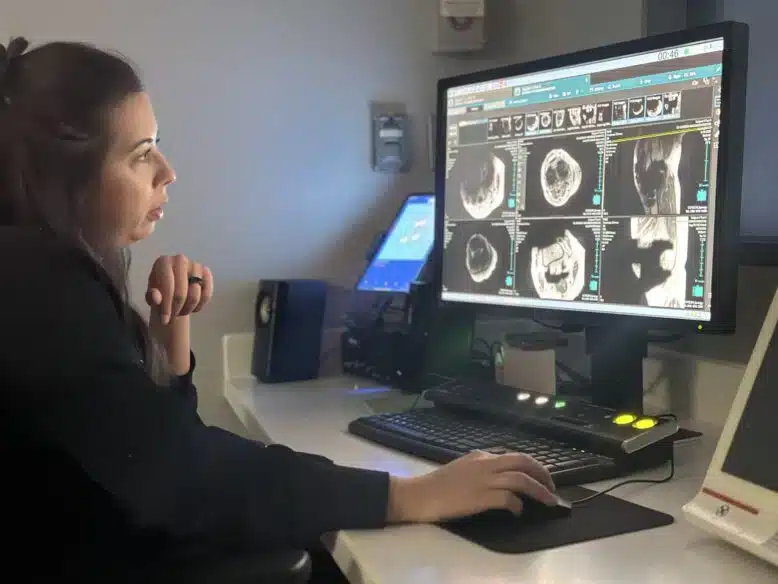 A radiologic technologist analyzing results, highlighting open healthcare and imaging jobs at Artesia General Hospital in Artesia, NM.